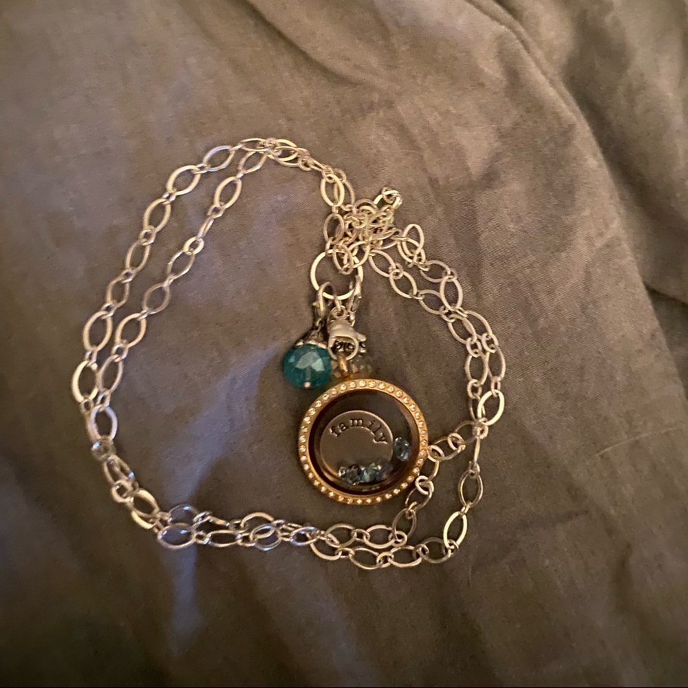 origami owl silver chain with large gold/crystal disc. and charmes